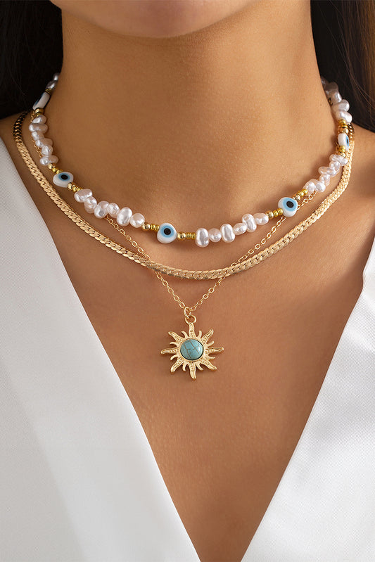 Gold Layered Pearl Necklace with Sun Pendant